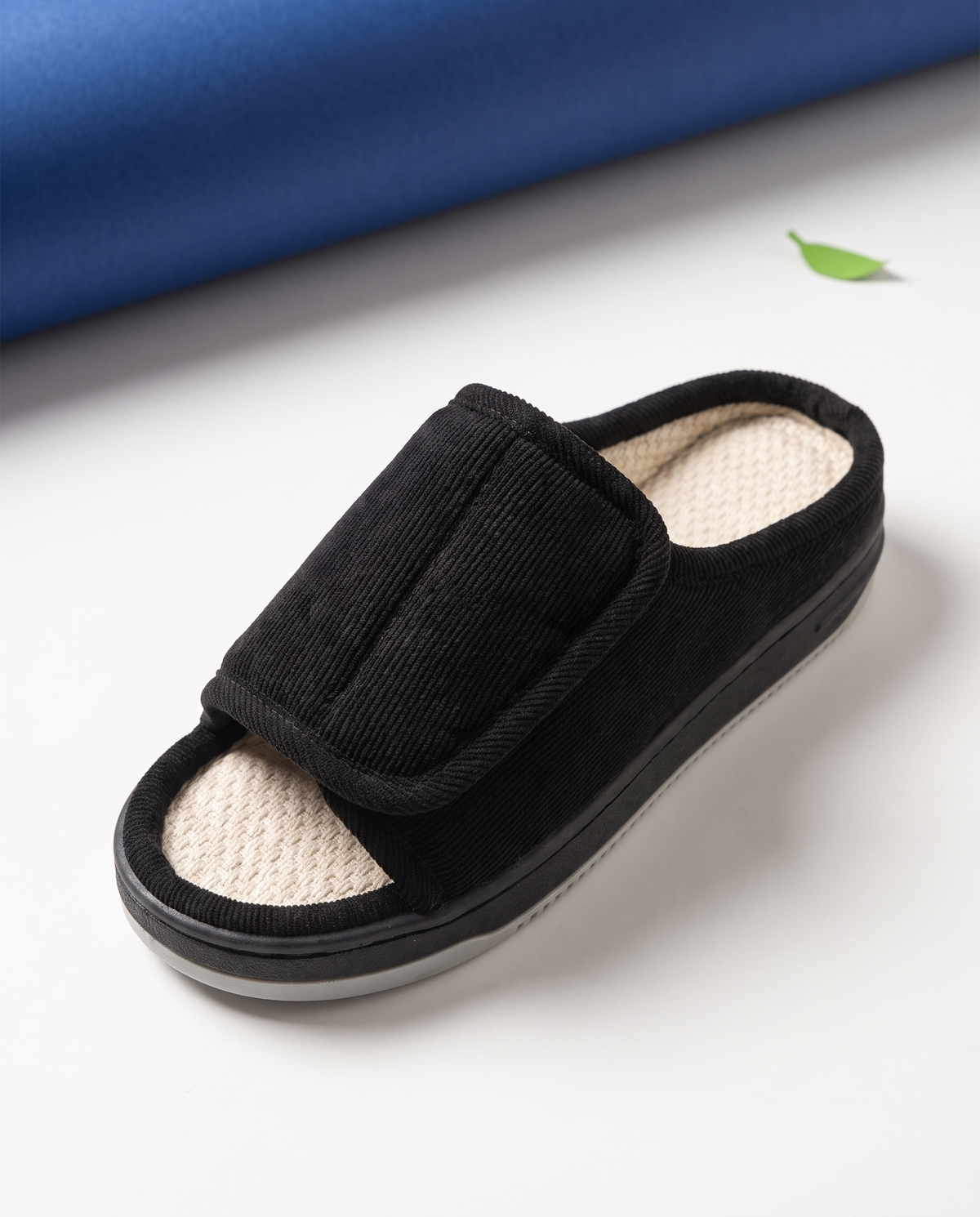 Open toe and cream interior of a ComfortFit slipper